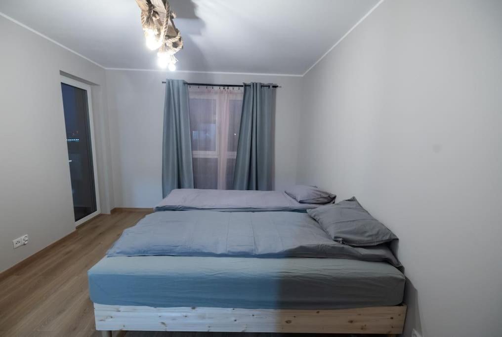 Przestronny apartament w Sosnowcu, miejsce parkingowe w hali garażowej