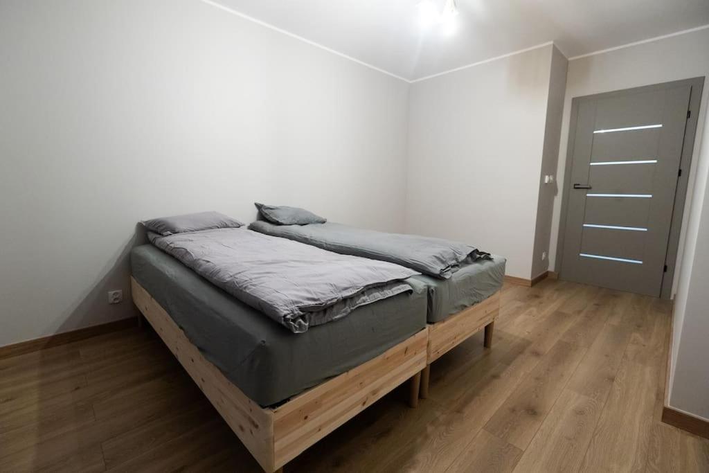 Przestronny apartament w Sosnowcu, miejsce parkingowe w hali garażowej