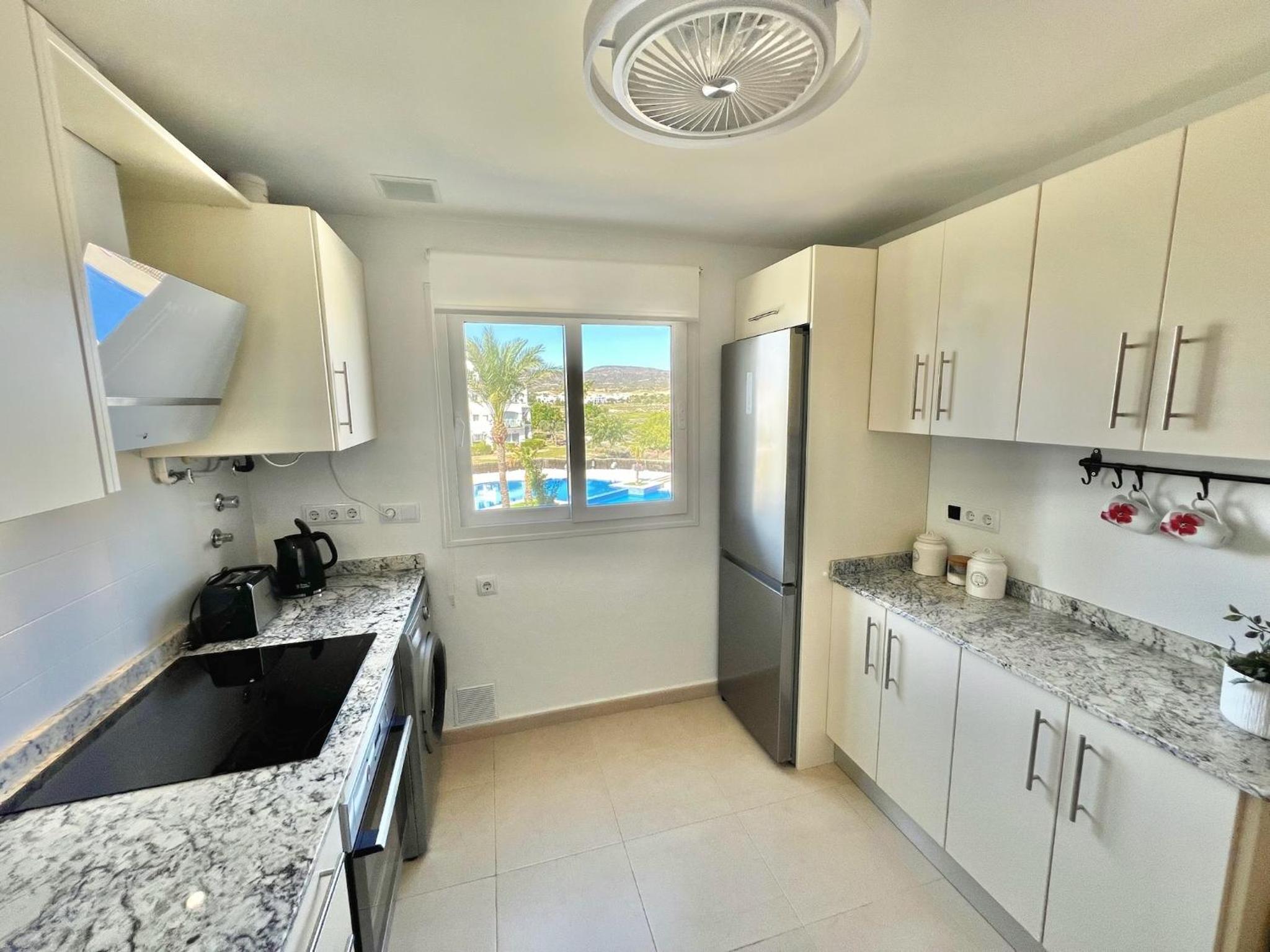 Stunning apartment with overflow pool and golf view