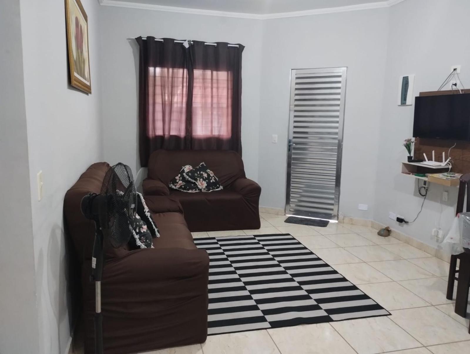 Casa na praia com piscina e churrasqueira