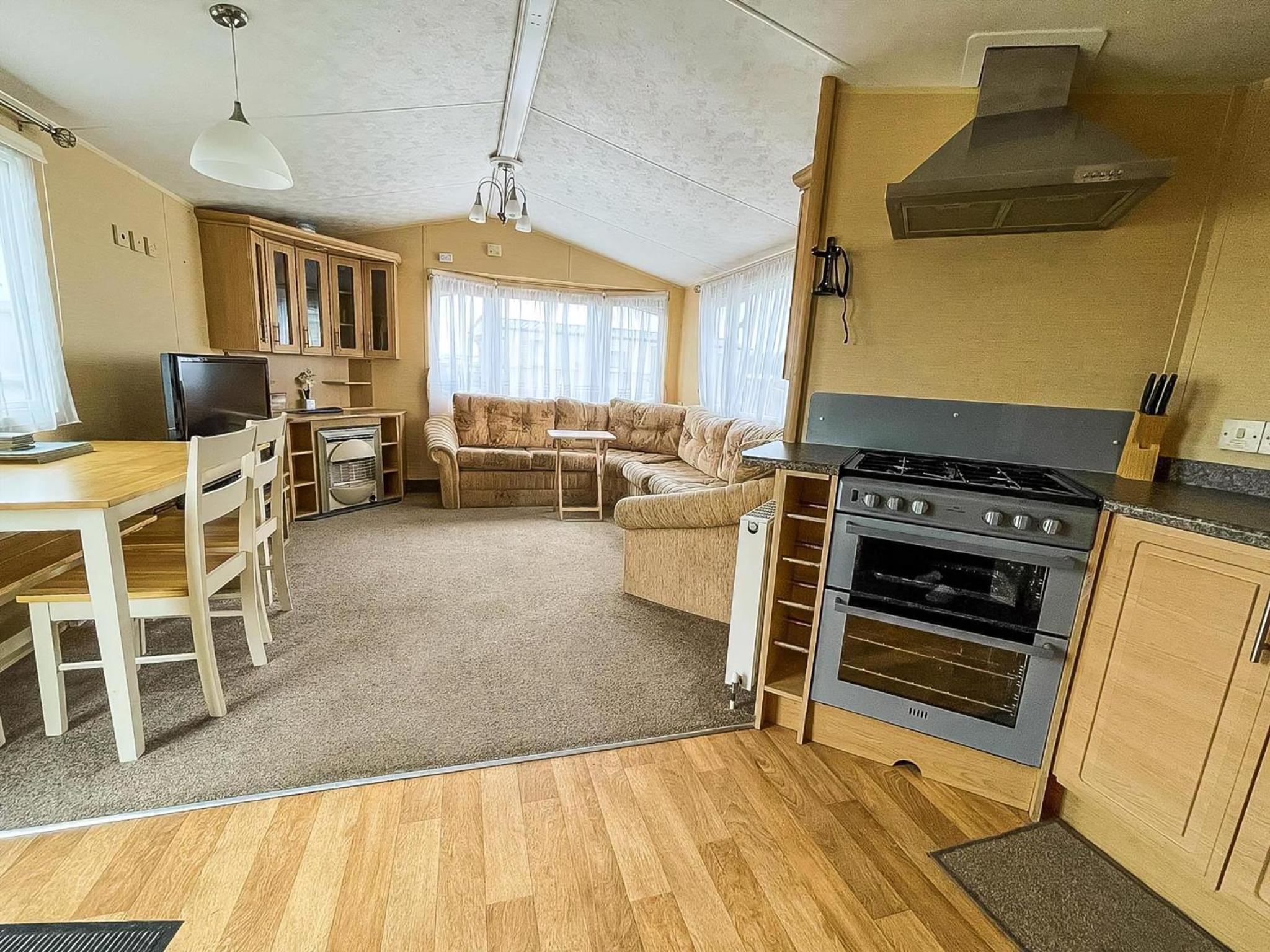 Great 6 Berth Caravan With Decking By The Beach In Suffolk Ref 40023Nd view 2