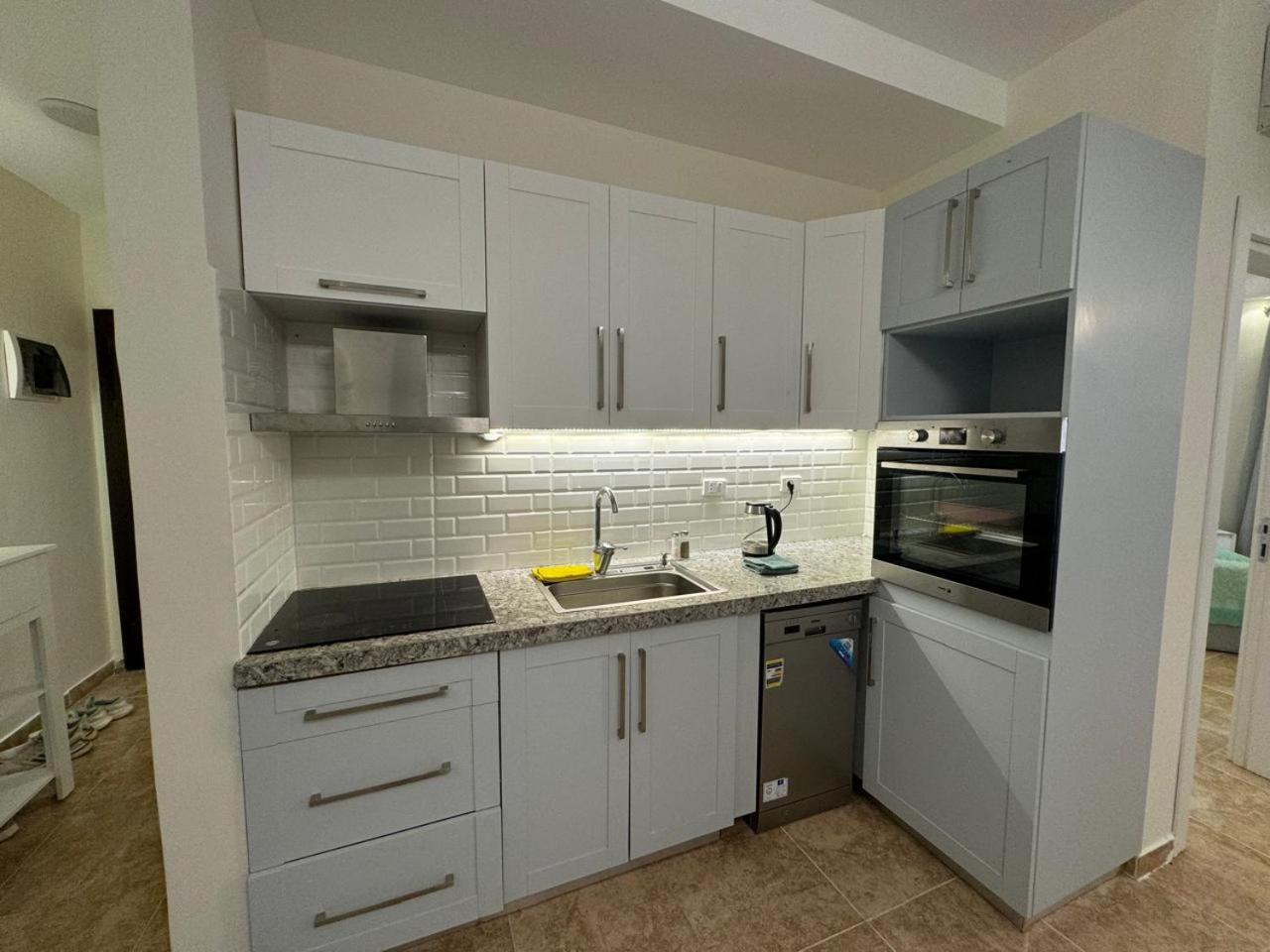 A one-bedroom apartment with a compact terrace