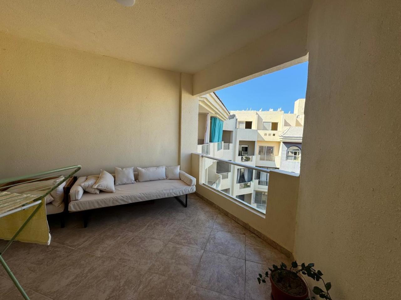 A one-bedroom apartment with a compact terrace