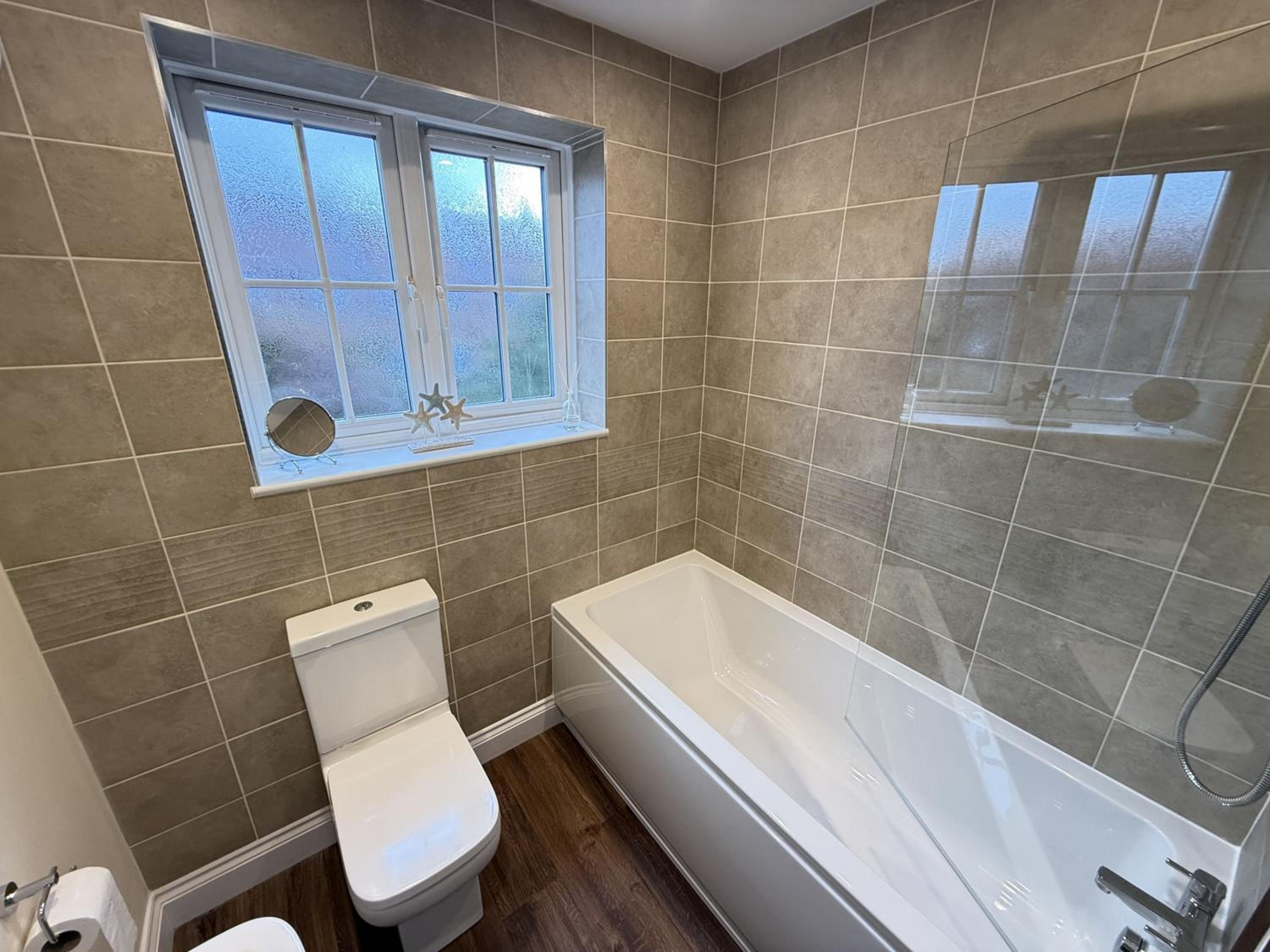 Pebble Cottage - Part of the The Bay Filey Holiday Village with pool, gym and direct beach access, pub, restaurant, tennis and meadows walks