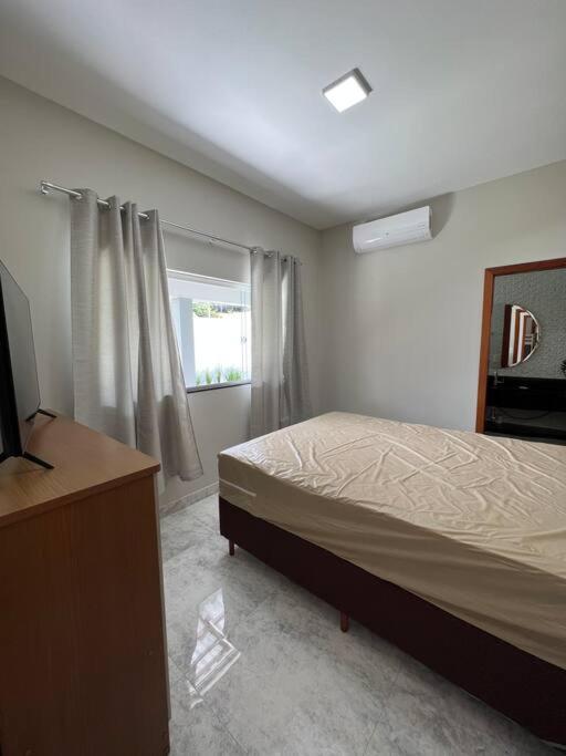Casa com piscina em Florestal