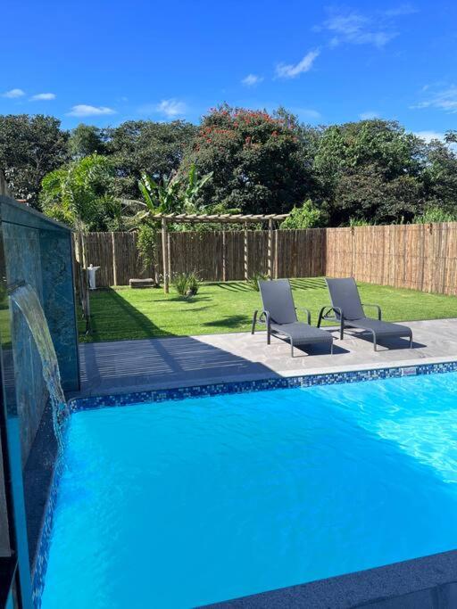 Casa com piscina em Florestal