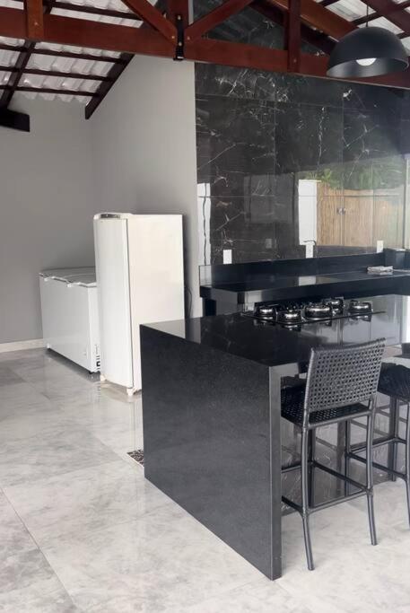 Casa com piscina em Florestal