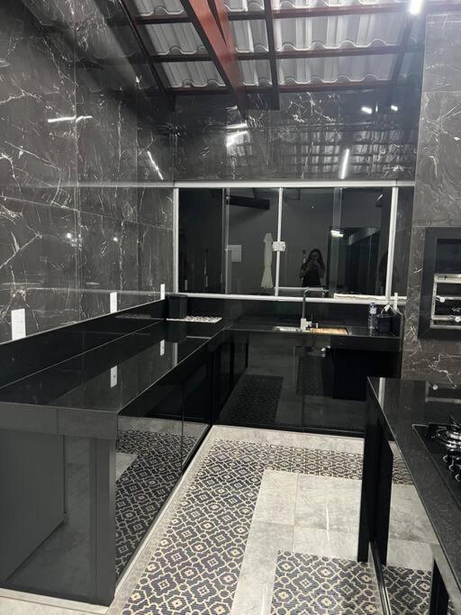 Casa com piscina em Florestal