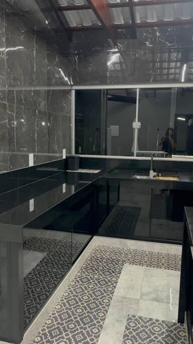 Casa com piscina em Florestal