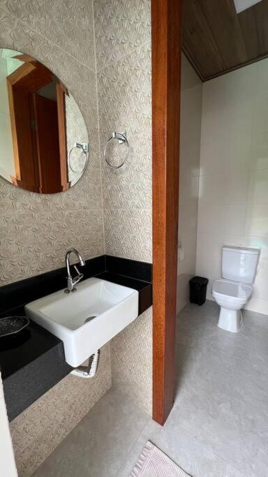 Casa com piscina em Florestal