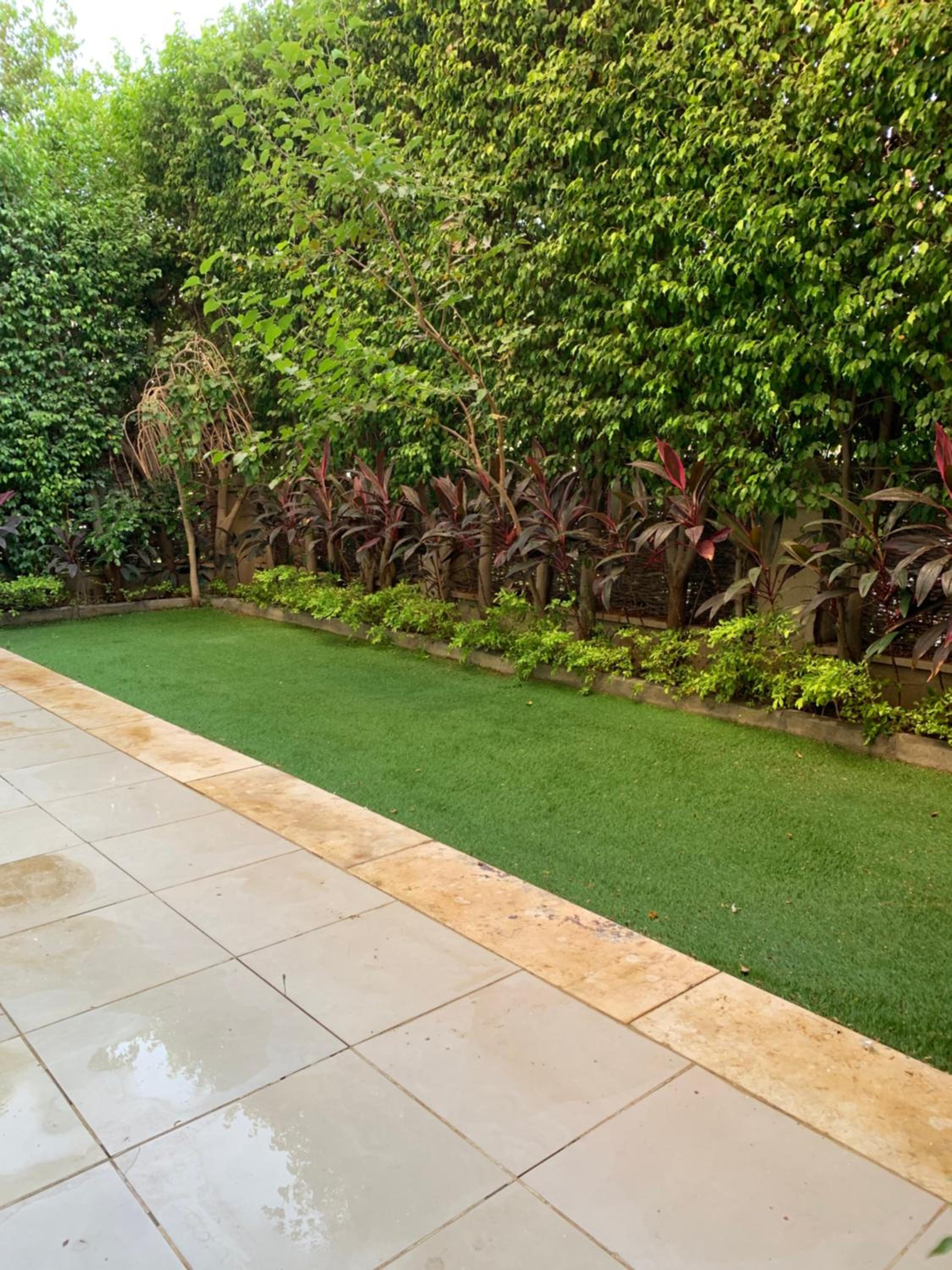 Private Garden 1BR Apt in Palm Hills AUC New Cairo