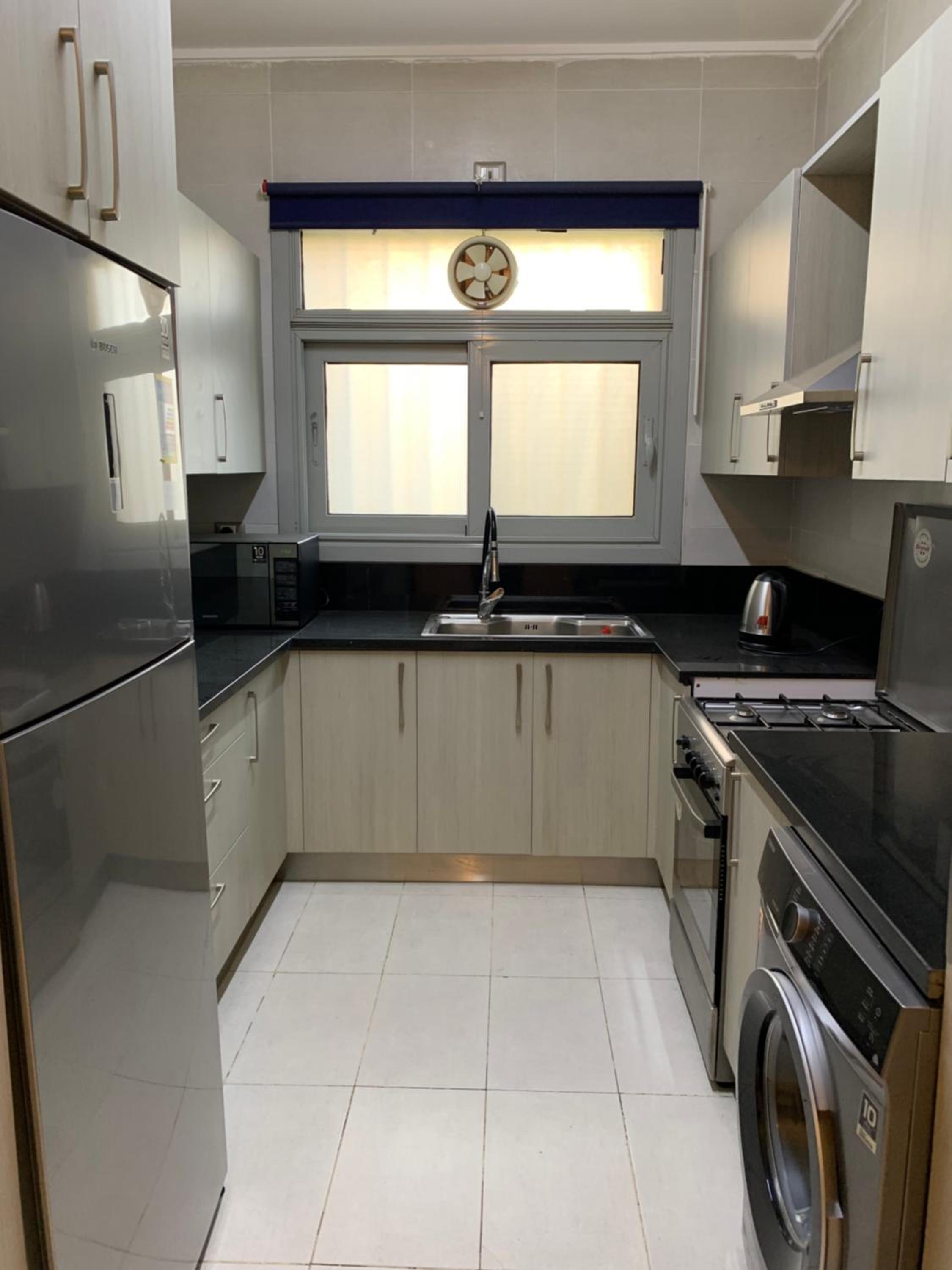 Private Garden 1BR Apt in Palm Hills AUC New Cairo