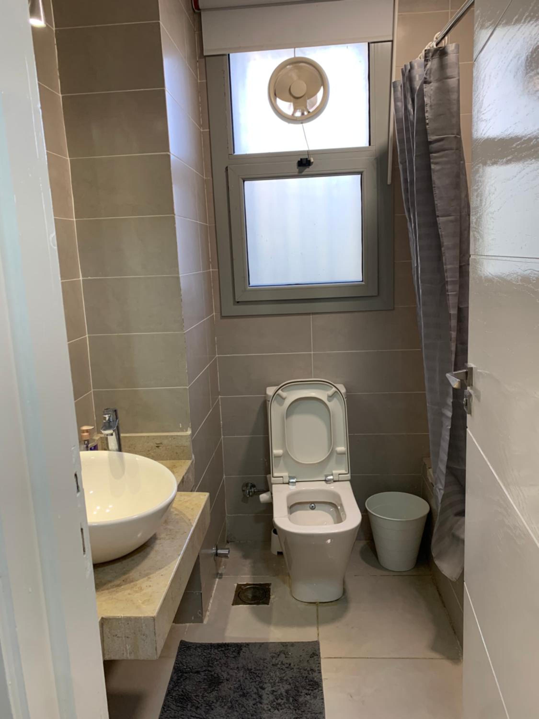 Private Garden 1BR Apt in Palm Hills AUC New Cairo