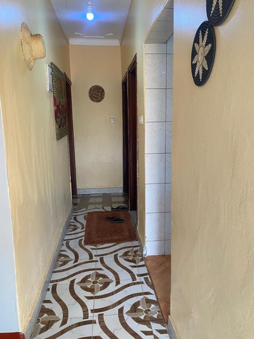 NileBnb-1 minute to The Hangout Furnished Kitchen, Parking and Private Patio view 3