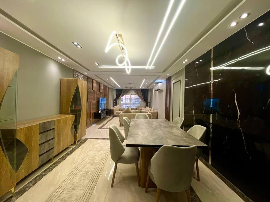 Stylish 3BR Apartment in Prime Mohandessin for families Y7