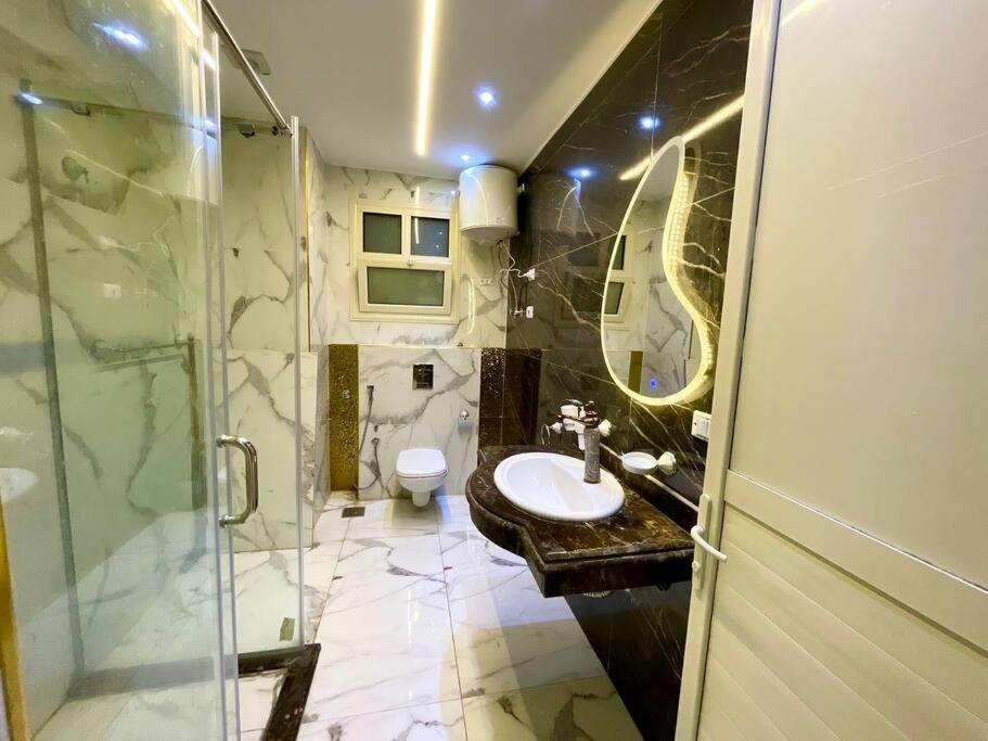 Stylish 3BR Apartment in Prime Mohandessin for families Y7