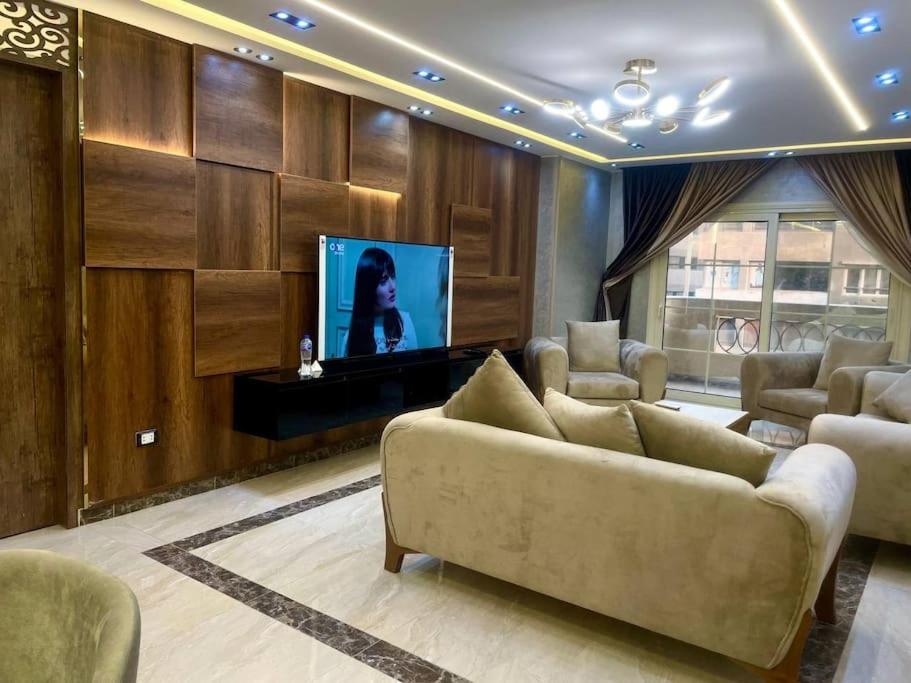 Stylish 3BR Apartment in Prime Mohandessin for families Y7