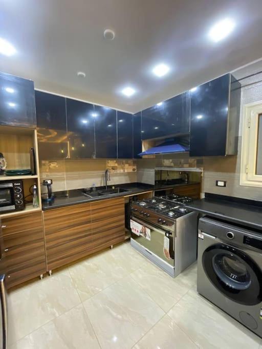 Stylish 3BR Apartment in Prime Mohandessin for families Y7