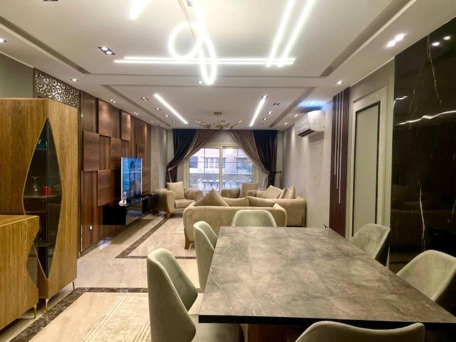 Stylish 3BR Apartment in Prime Mohandessin for families Y7
