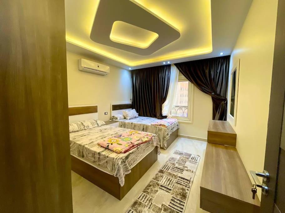 Stylish 3BR Apartment in Prime Mohandessin for families Y7