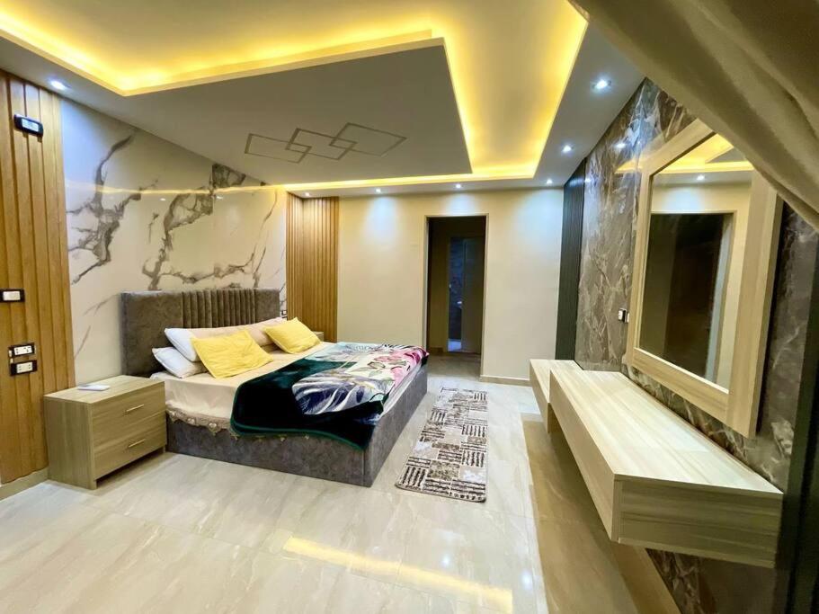 Stylish 3BR Apartment in Prime Mohandessin for families Y7