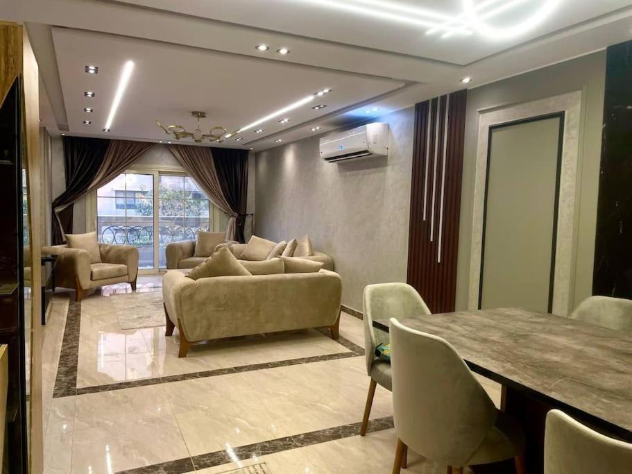 Stylish 3BR Apartment in Prime Mohandessin for families Y7