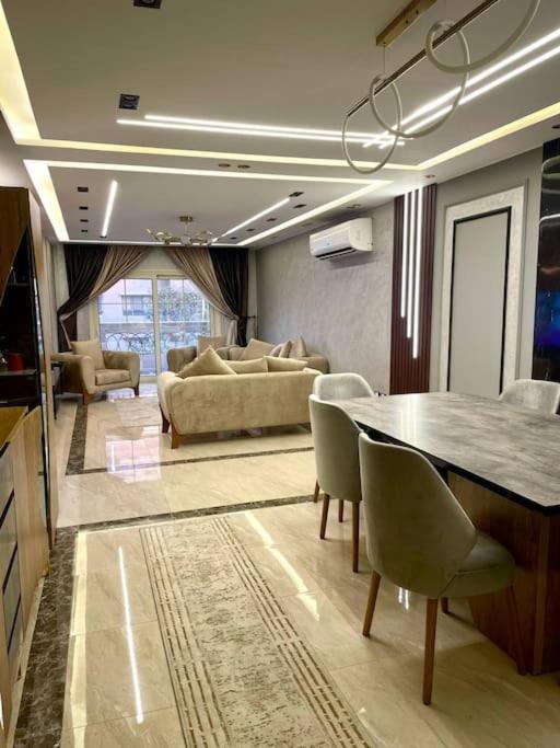 Stylish 3BR Apartment in Prime Mohandessin for families Y7
