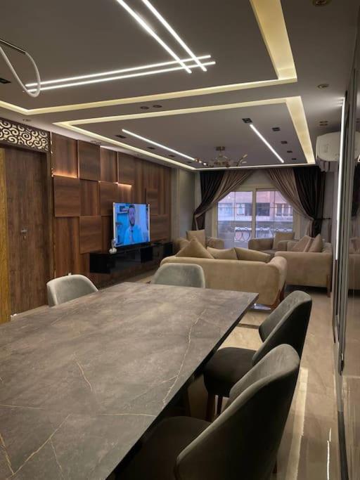 Stylish 3BR Apartment in Prime Mohandessin for families Y7