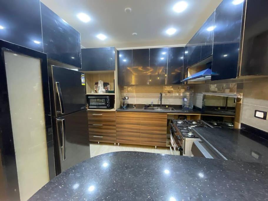 Stylish 3BR Apartment in Prime Mohandessin for families Y7