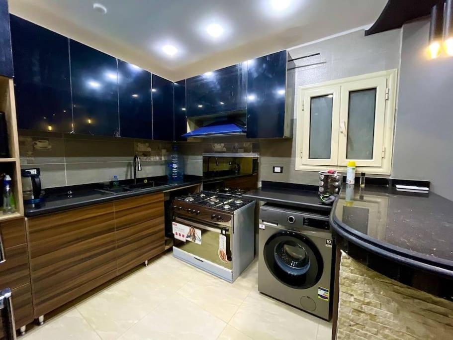 Stylish 3BR Apartment in Prime Mohandessin for families Y7