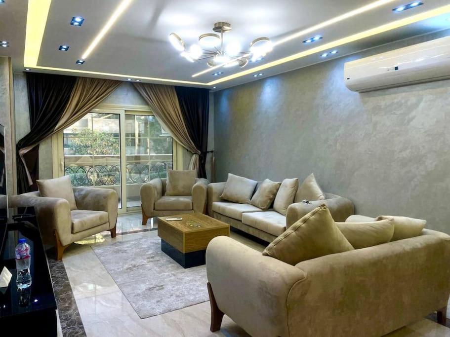 Stylish 3BR Apartment in Prime Mohandessin for families Y7
