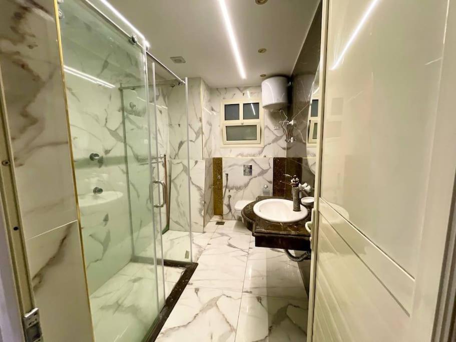 Stylish 3BR Apartment in Prime Mohandessin for families Y7