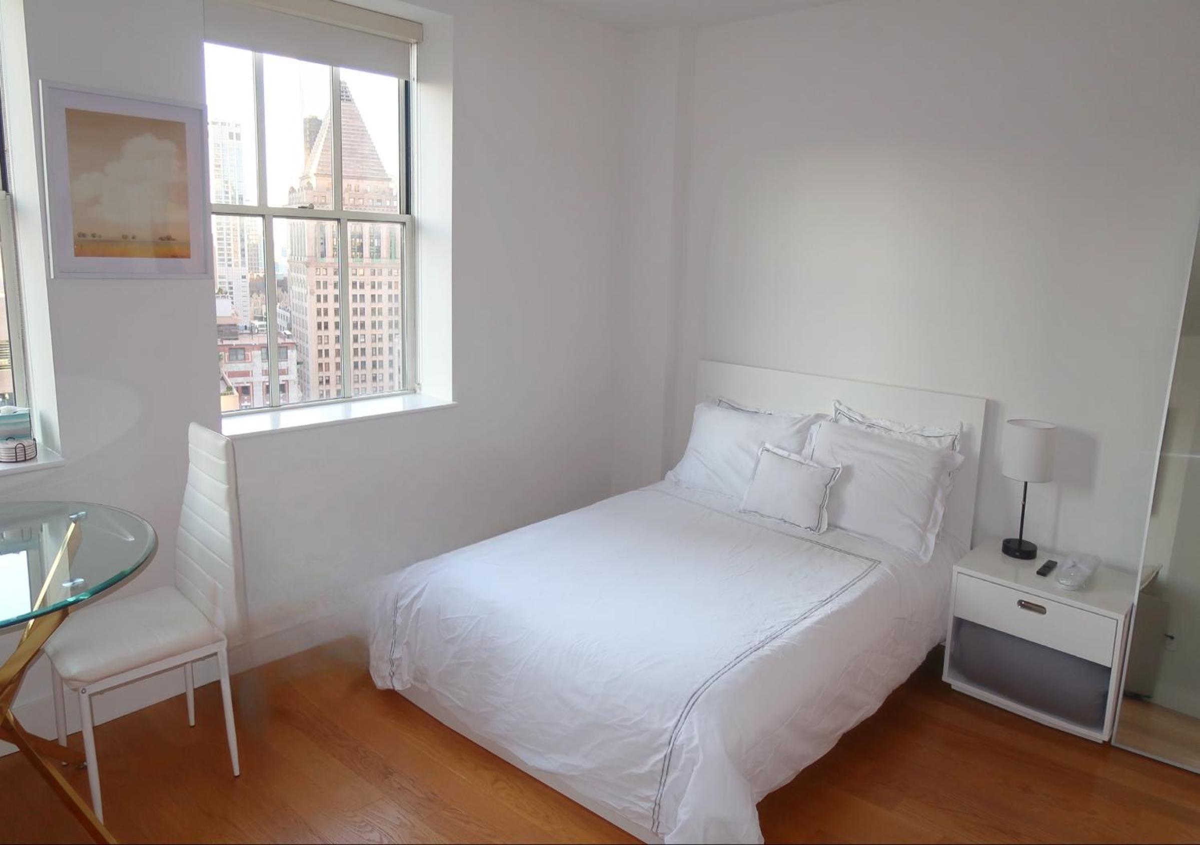 Luxury Wall St Condo