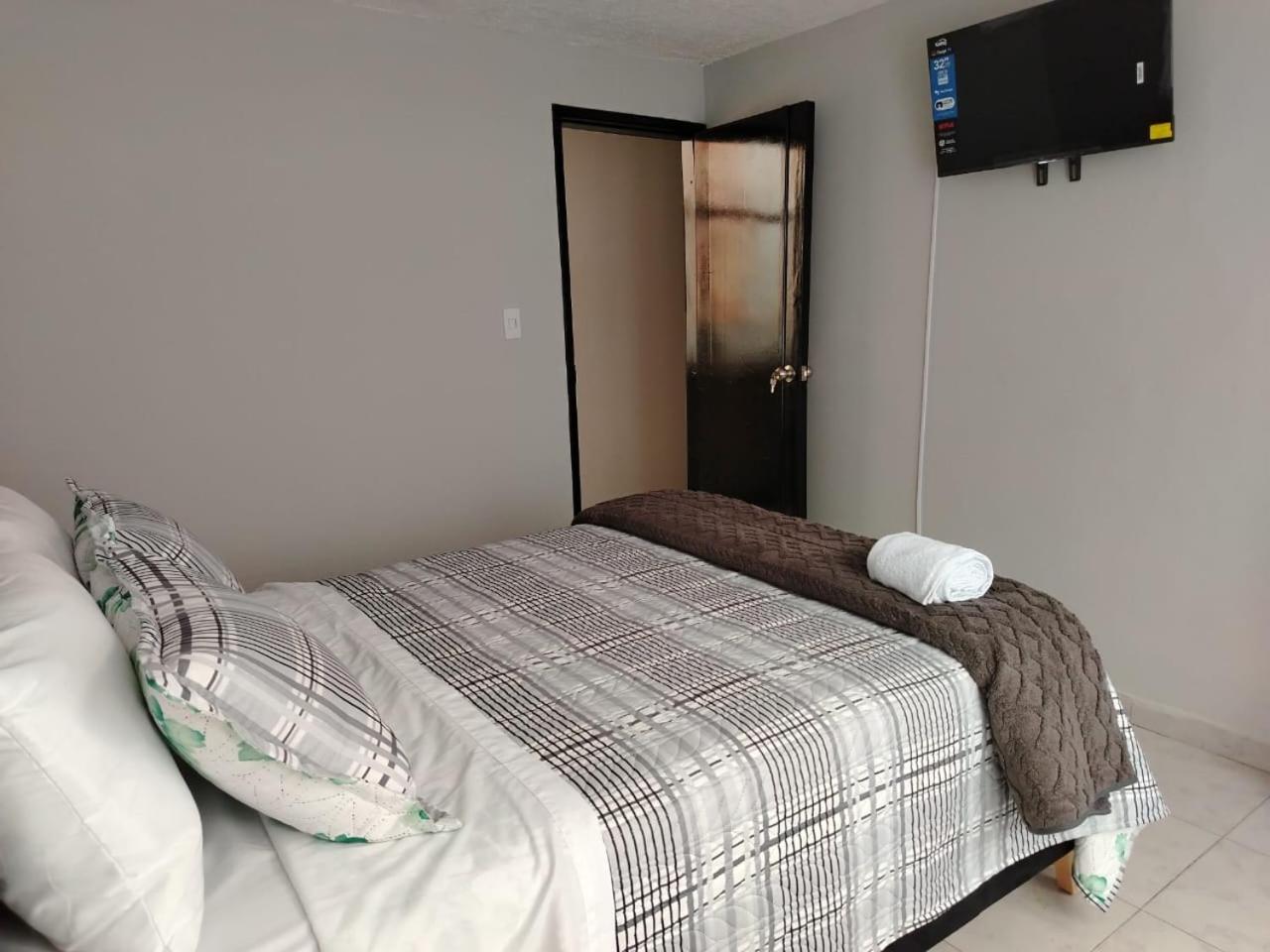 Dos Habitación independientes con Baño compartido