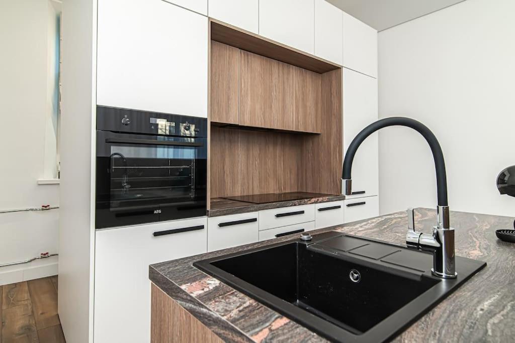 Modern Apartment in the heart of Vilnius Old Town by URBAN RENT view 5
