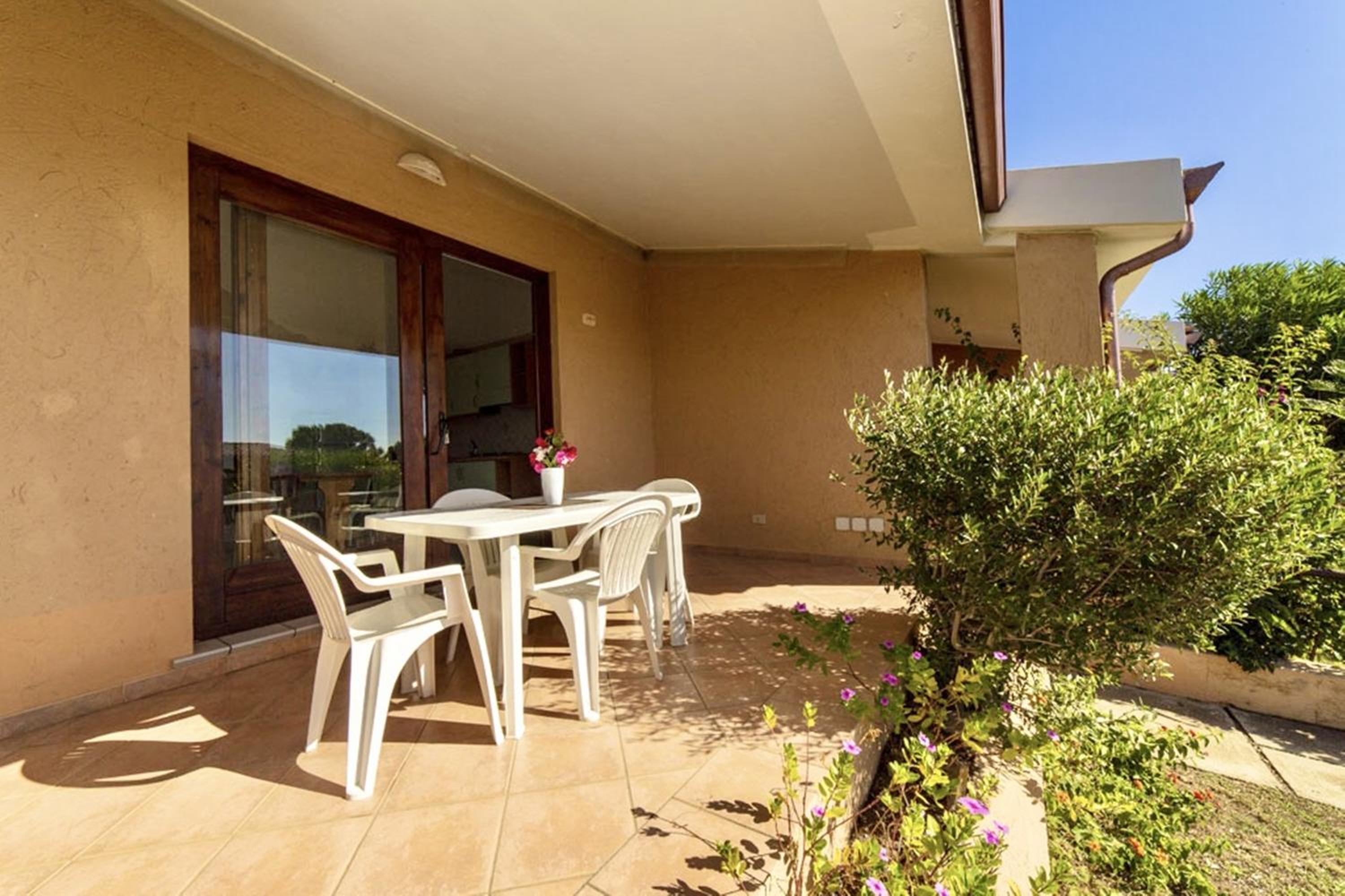 Village in Porto Corallo just 200 meters from the beach, apartments with private outdoor area photo 3