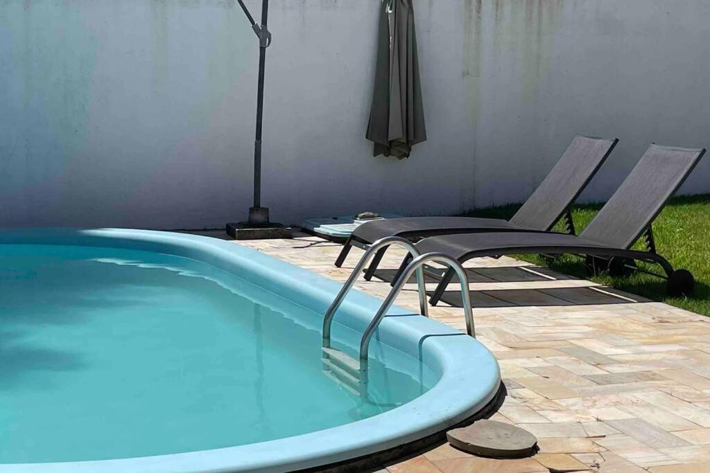 Casa Jurere Internacional com 6 quartos e piscina, churrasqueira , 300m do mar