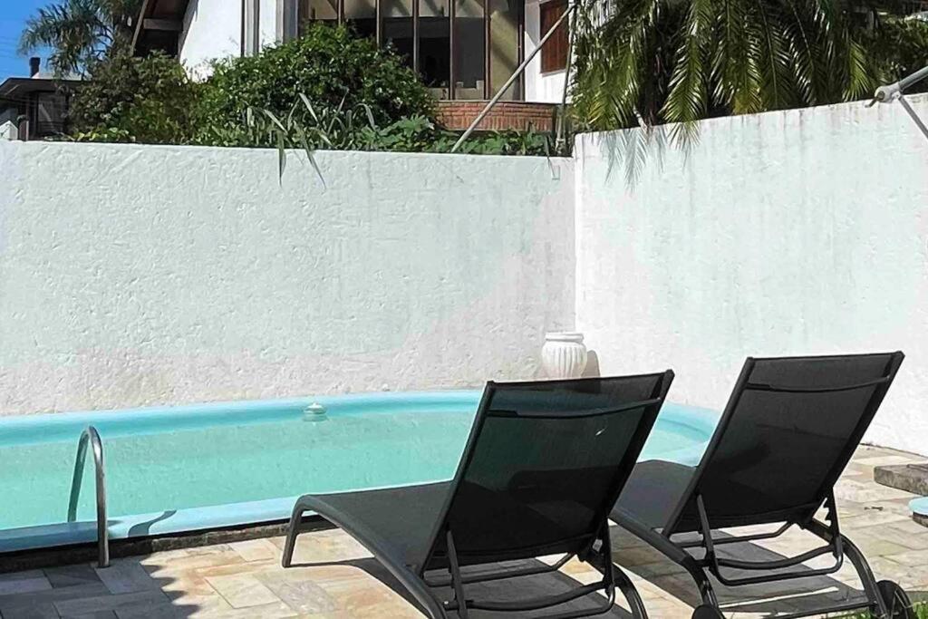 Casa Jurere Internacional com 6 quartos e piscina, churrasqueira , 300m do mar