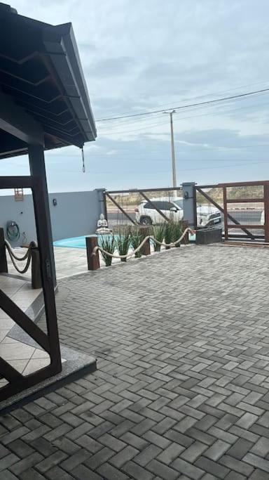 Moradas do Pier 2- apartamento a passos da areia, com vista perfeita da praia e plataforma em Tramandaí!