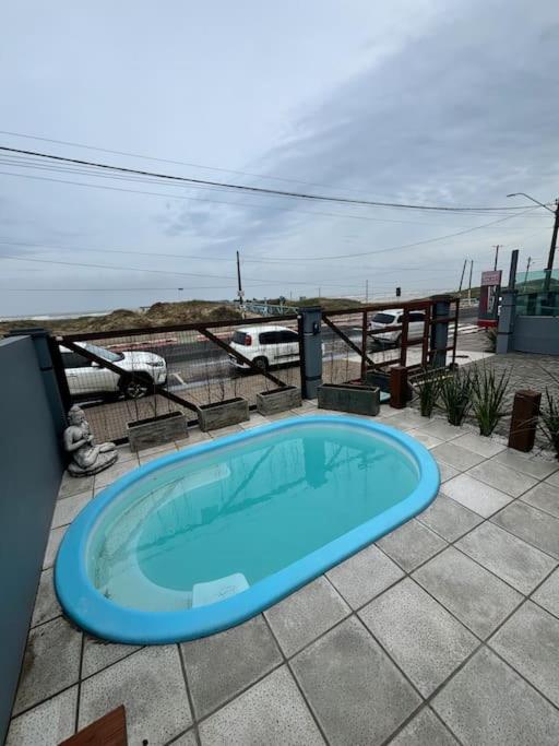 Moradas do Pier 2- apartamento a passos da areia, com vista perfeita da praia e plataforma em Tramandaí!