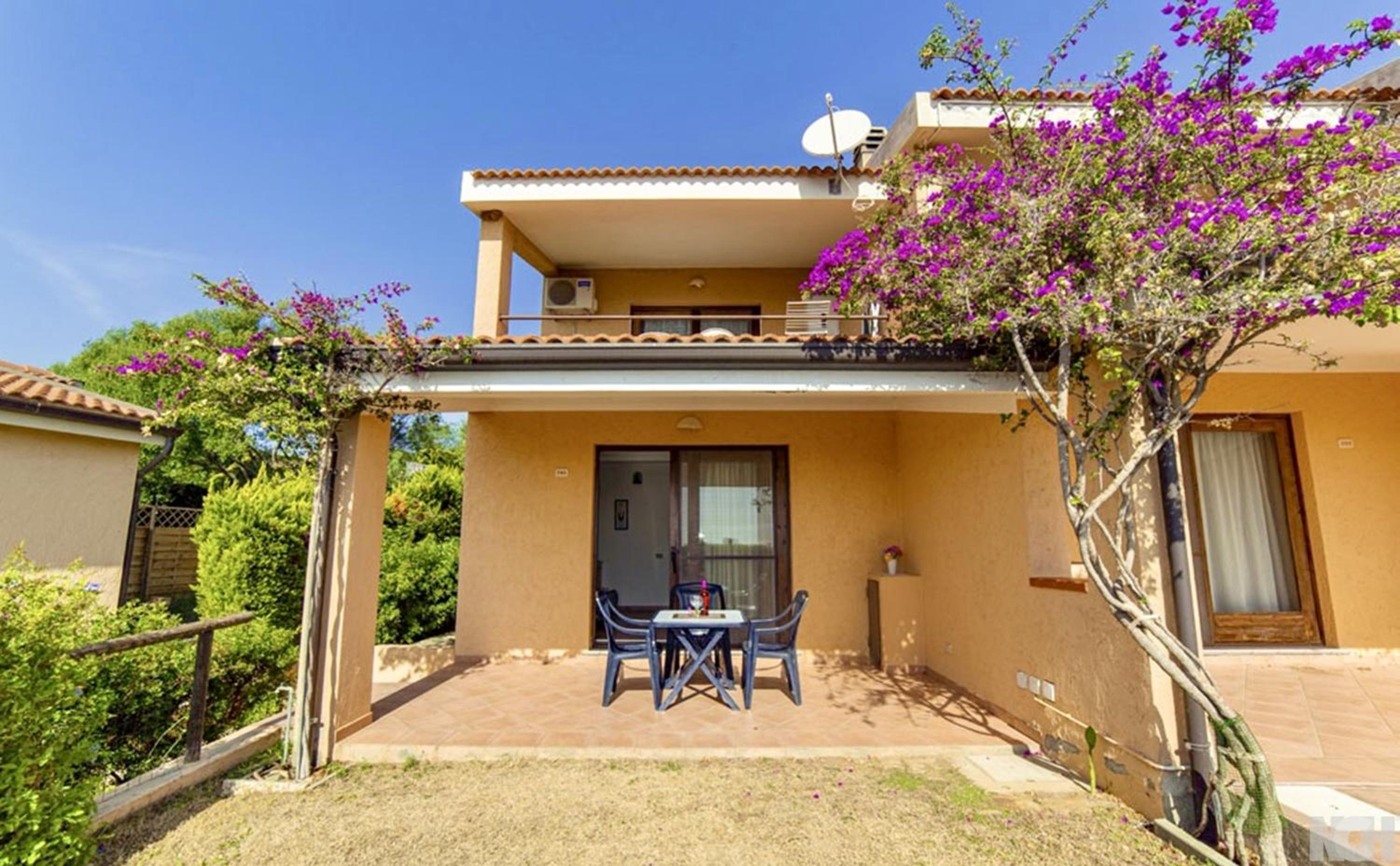 Village in Porto Corallo just 200 meters from the beach, apartments with private outdoor area photo 2