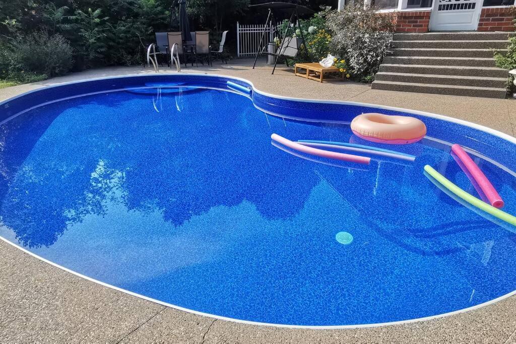 Waterfront heated pool seasonal Acre yard BBQ