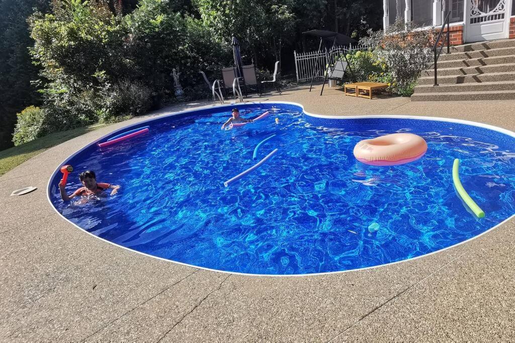 Waterfront heated pool seasonal Acre yard BBQ