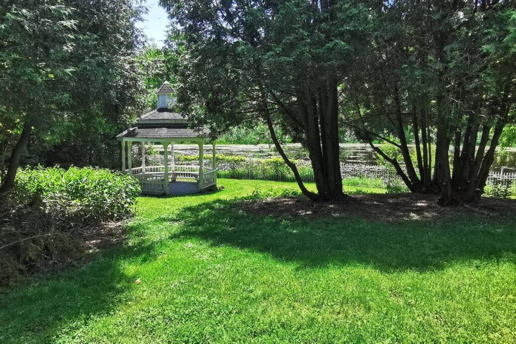 Waterfront heated pool seasonal Acre yard BBQ