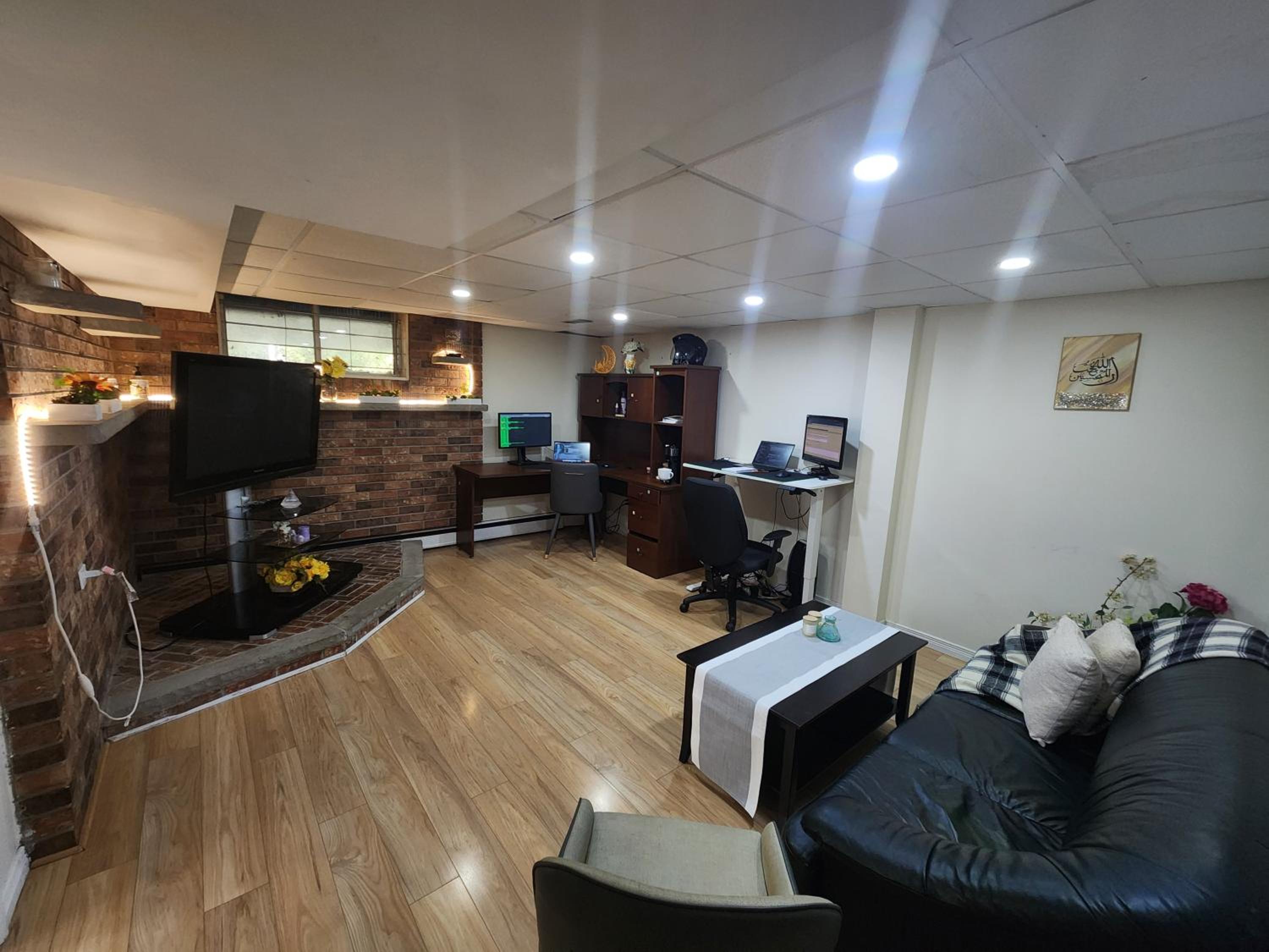 Private room with shared space in a basement