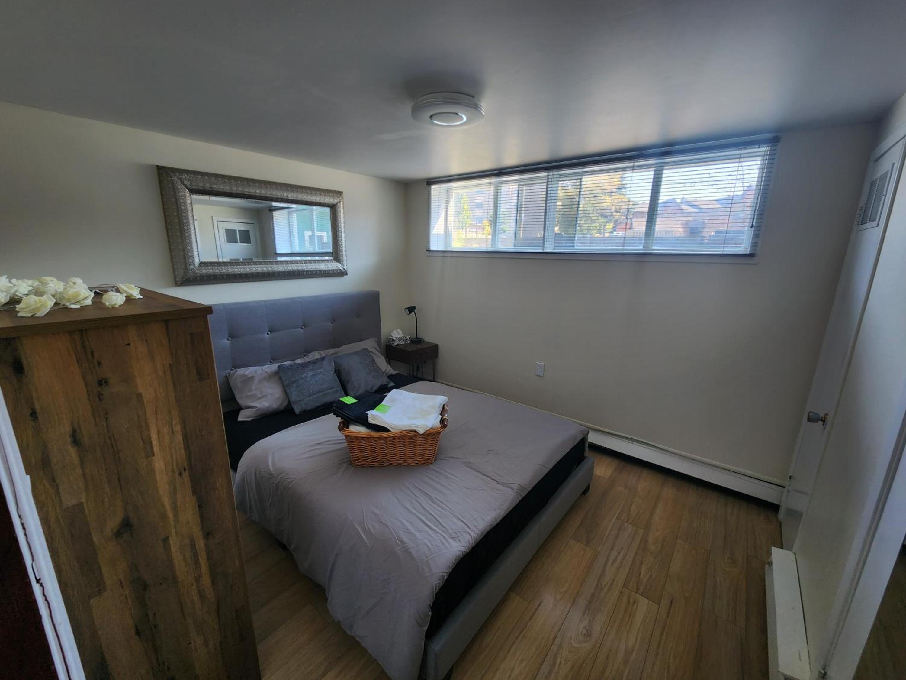 Private room with shared space in a basement