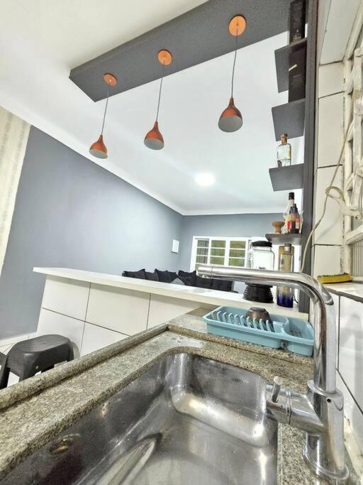 Casa com Piscina Cascata Na Praia Grande