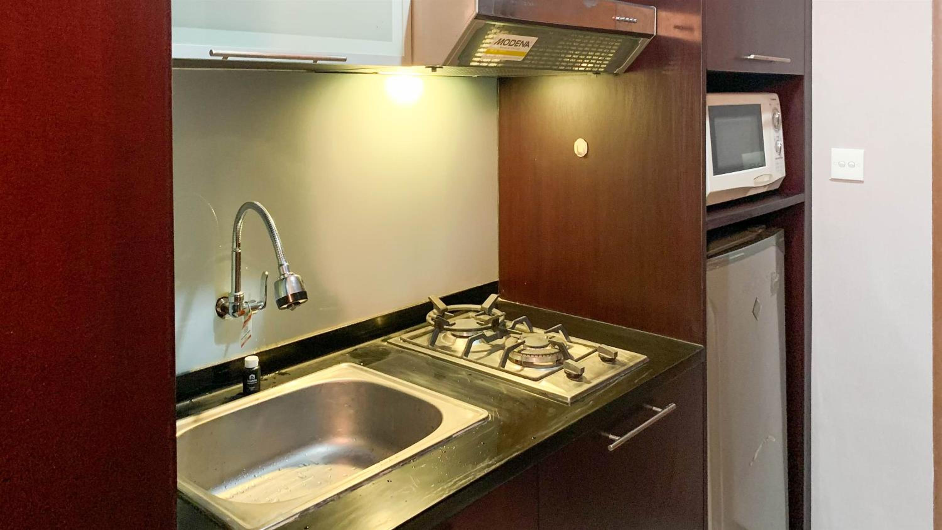 Comfort and Minimalist 2BR at Maple Park Sunter Apartment By Travelio view 3