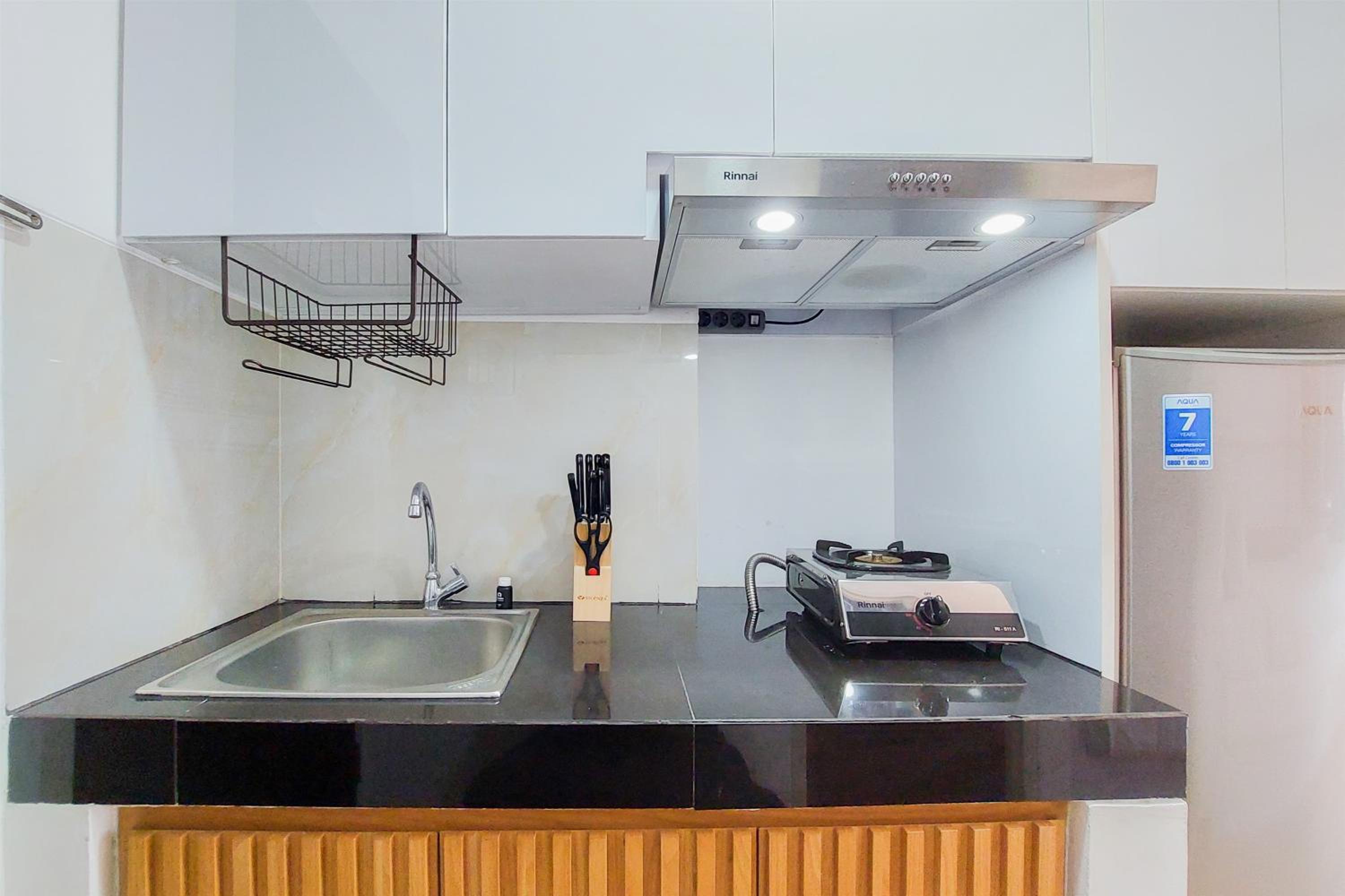 Homey and Cozy Stay Studio Room at Serpong Garden Apartment By Travelio