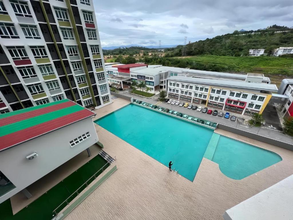 Spacious Apartment near IIUM Medical Centre, ECR & Teluk Cempedak with Smart TV & Pool photo 6
